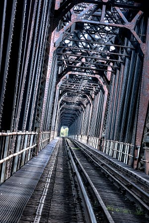 a old train bridge with repeated lines