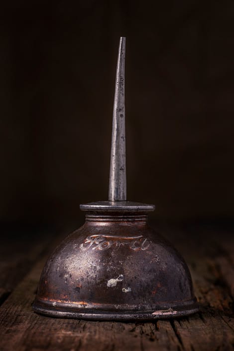 a vintage automotive oiler tin