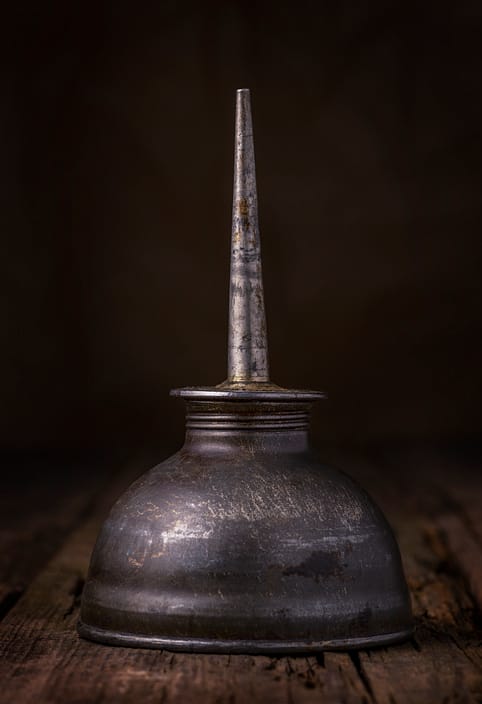 a vintage automotive oiler tin